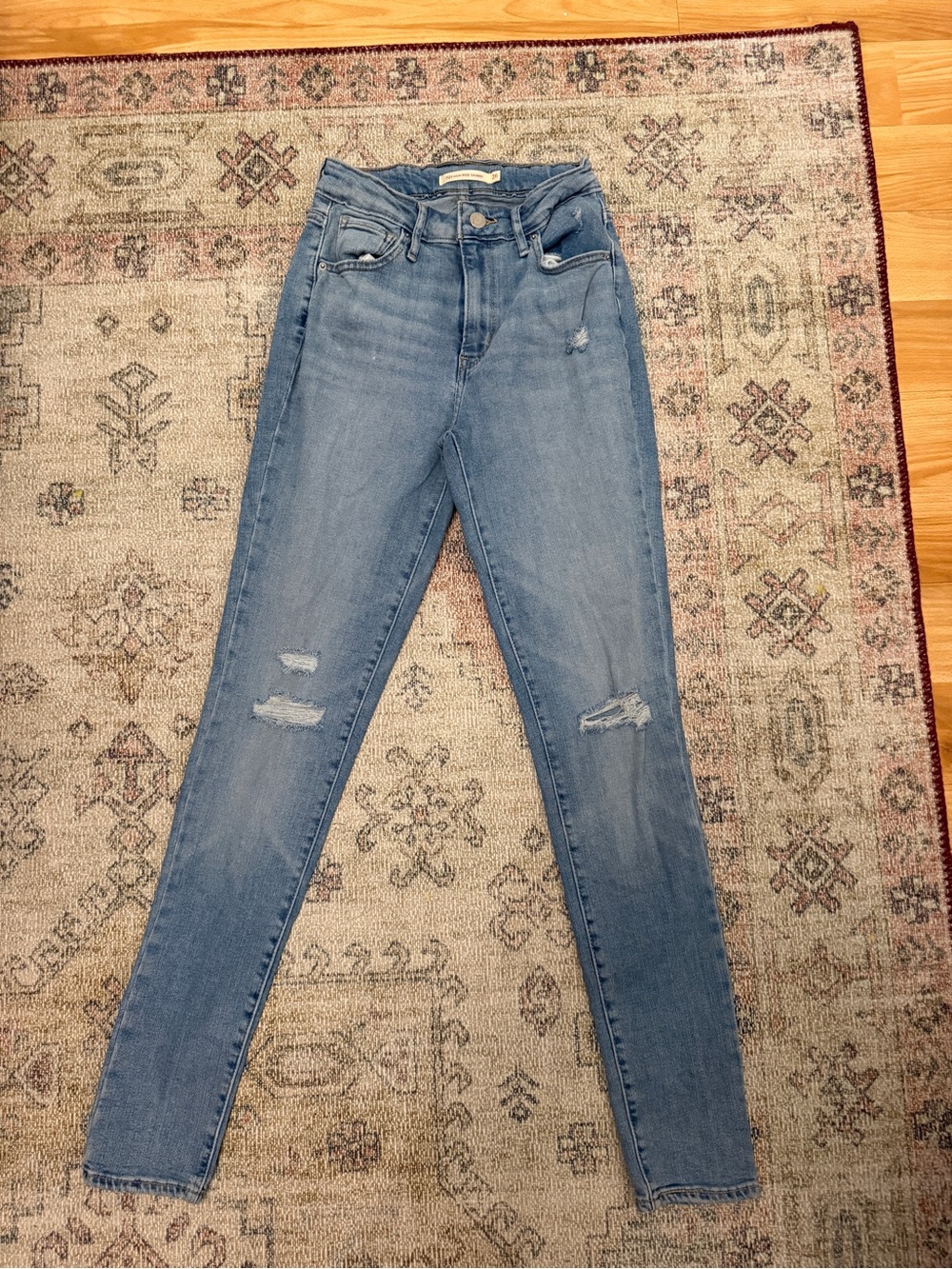 Levi's Medium Blue High-Rise Skinny Jeans with Knee Distress